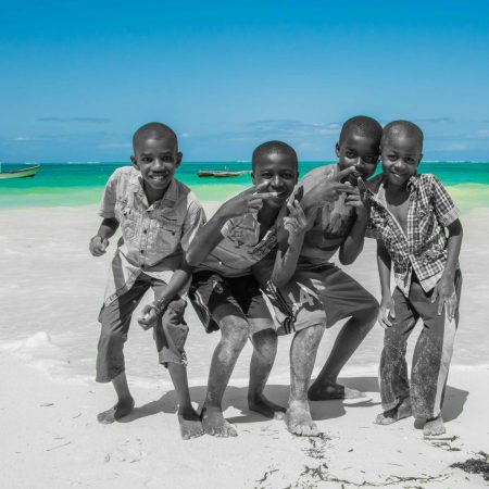 Boys_playing_on_a_Zanzibar_beach-7